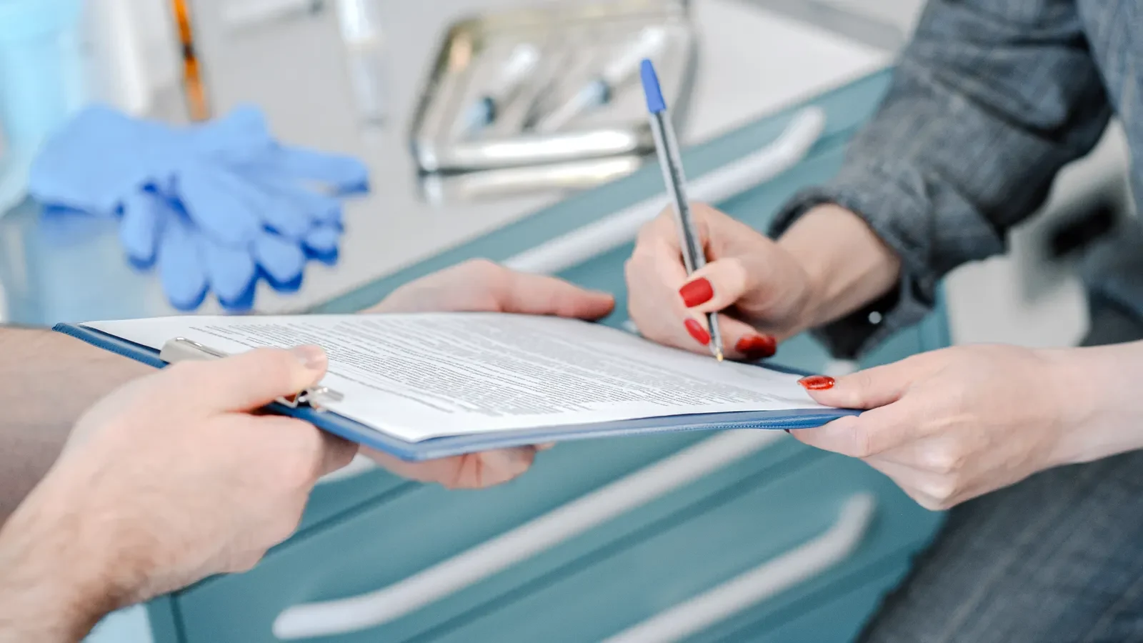 Hospital admissions and billing team coordinating a patient authorization
