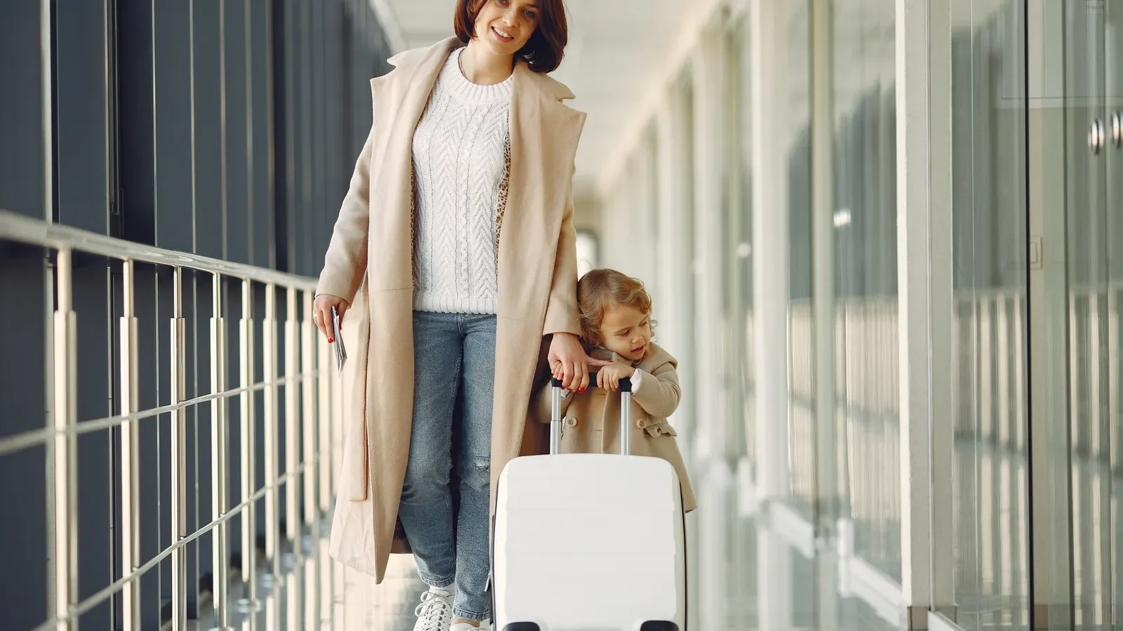 Travel support coordinator assisting a family during a medical journey